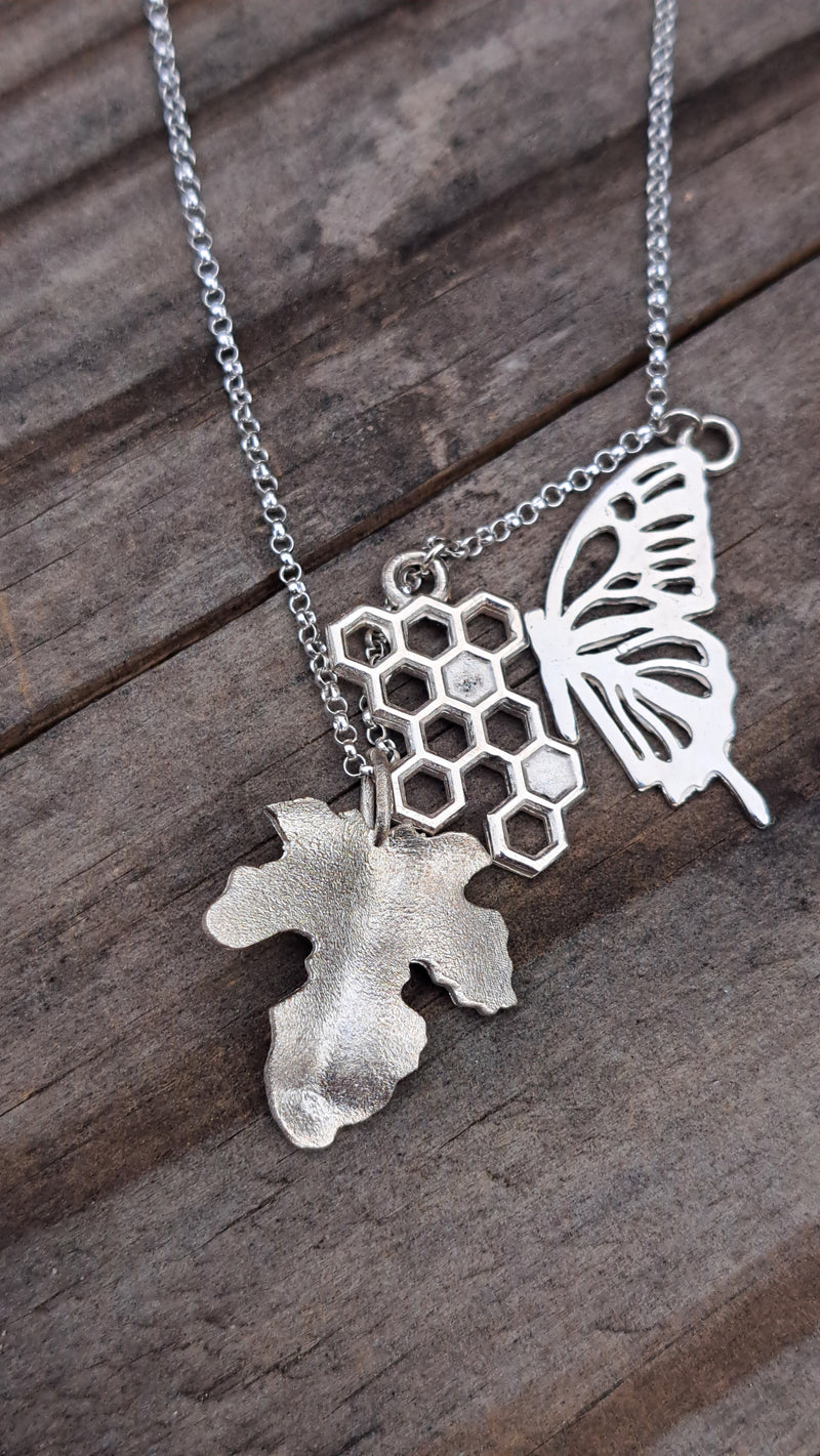 Fig Leaf, Honeycomb, And Butterfly Pendant
